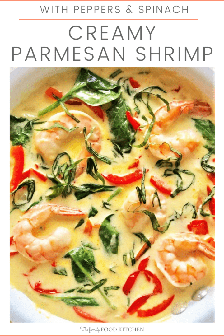 Pinnable image with recipe title of cooked shrimps in a creamy sauce with sliced peppers and spinach in a white bowl.