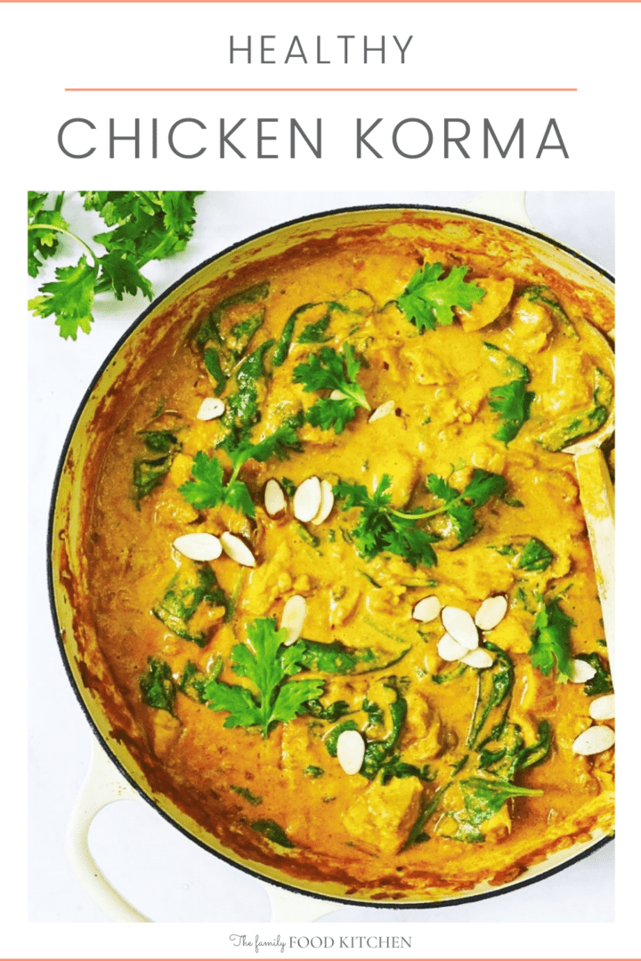 Pinnable image with recipe title and skillet with cooked chicken in a creamy curry sauce, garnished with almonds and fresh cilantro.