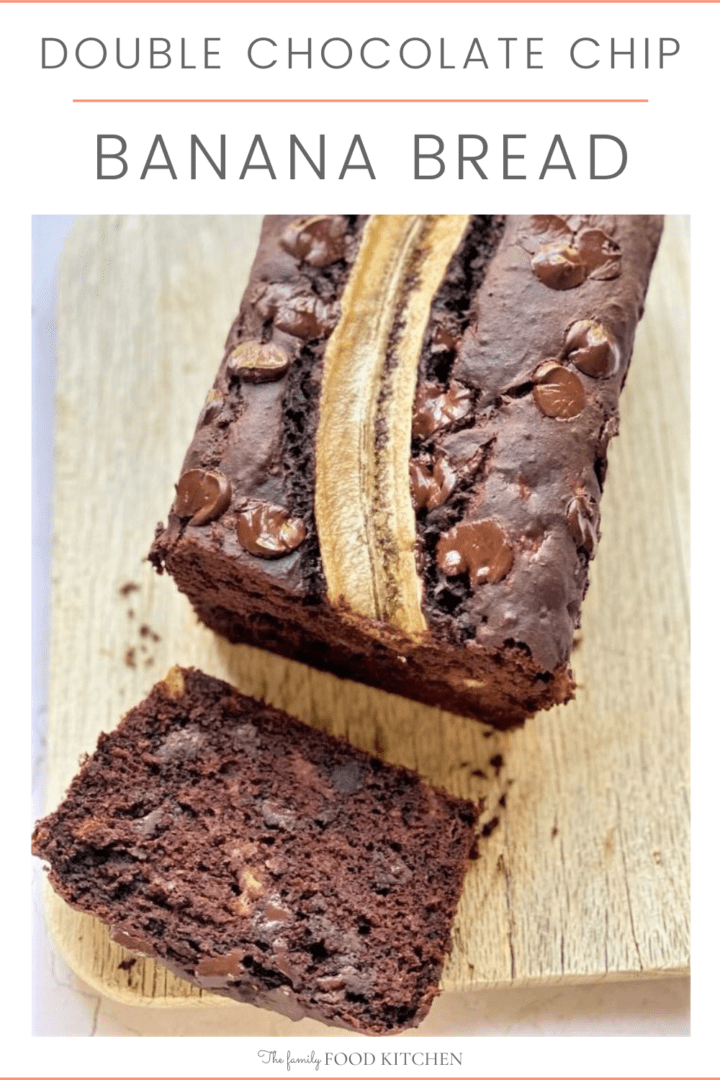 Pinnable image with recipe title and a whole baked chocolate banana bread on a board with a slice cut from the cake.