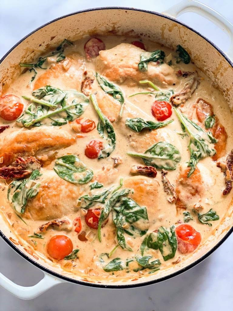 Creamy Skillet Tomato Spinach Chicken Breasts - The Family Food Kitchen