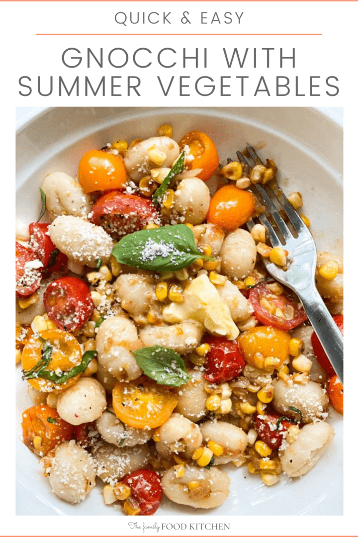 Pinnable image with recipe title and bowl of cooked gnocchi with mixed summer vegetables topped with grated Parmesan cheese and fresh basil leaves.