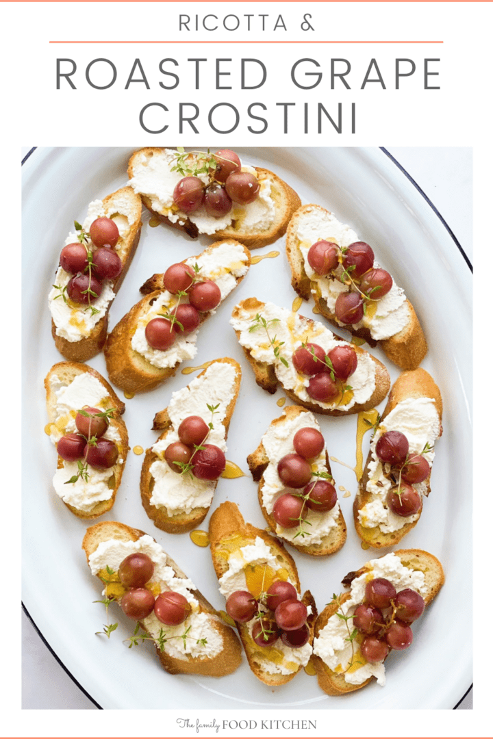 Pinnable image with recipe title and toasted slices of French bread topped with ricotta cheese and roasted grapes and drizzle of honey.