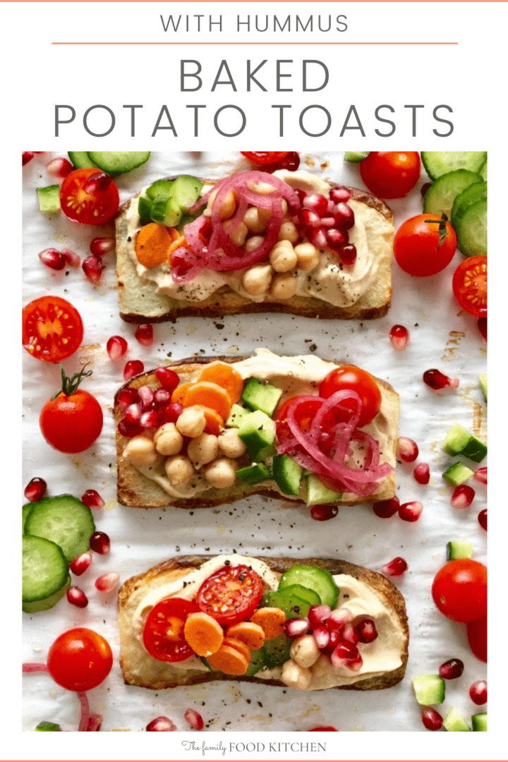 Pinnable image with recipe title and cooked slices of baked potato topped with hummus, chickpeas, vegetables and pomegranate seeds.