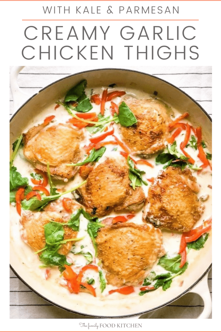 Pinnable image with recipe title and crispy skinned chicken thighs cooked in a creamy sauce with vegetables in a cast skillet.