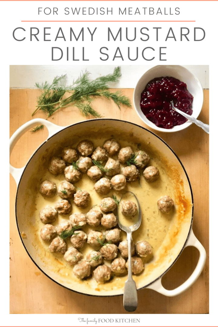 Pinnable image with recipe title and cast skillet with cooked meatballs covered in sauce, a bowl with berry sauce and a sprig of fresh dill.