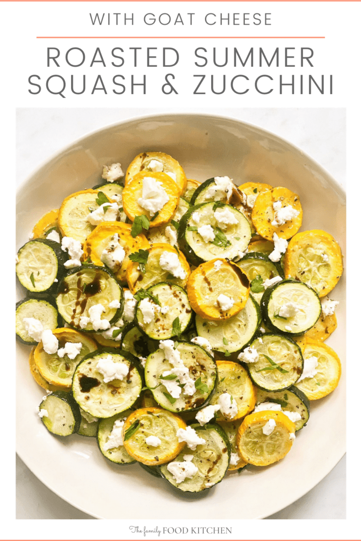 Pinnable image with recipe title and bowl of roasted squash and zucchini topped with crumbled goats cheese.