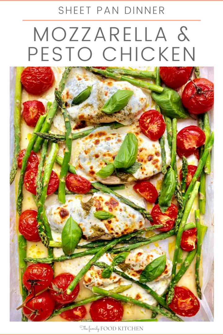 Pinnable image with recipe title and cooked chicken topped with mozzarella cheese, asparagus, tomatoes and basil shown on a sheet pan.