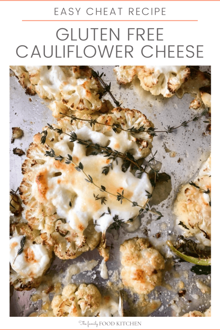 Pinnable image with recipe title and top down image of roasted cauliflower steaks topped with creme fraiche, shredded cheese and sprigs of thyme on a roasting tray.