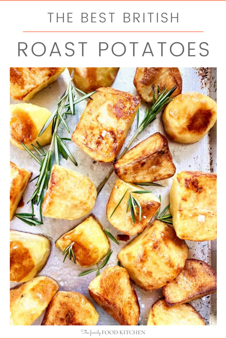 Pinnable image with recipe title and image of tray filled with crispy roasted potatoes, garnished with sprigs of fresh rosemary and a scattering of sea salt.