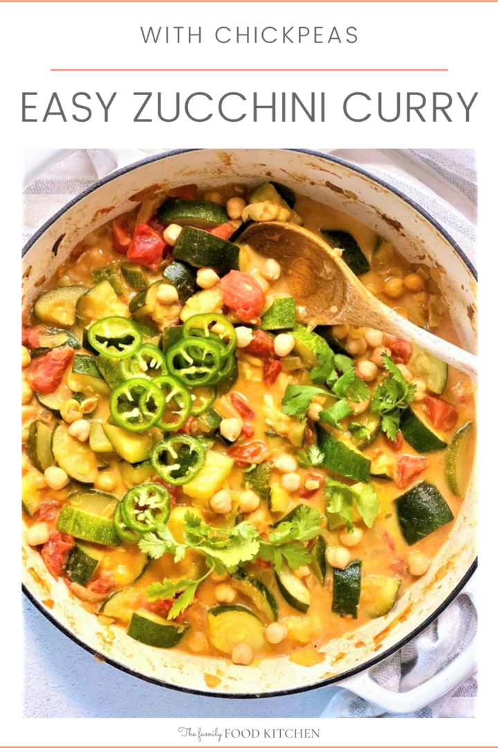 Pinnable image with recipe title and pan containing cooked zucchini curry topped with a scattering of freshly chopped green chilies and cilantro.