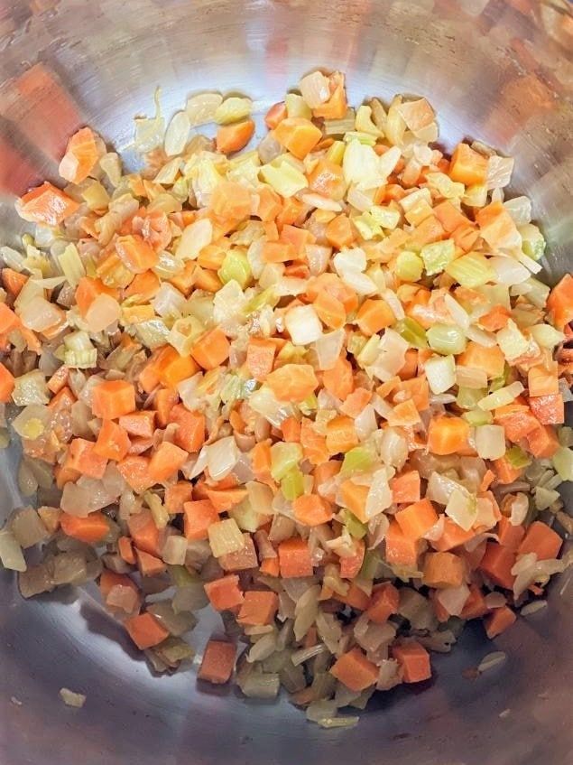Sauteed onion, carrot, celery and garlic in base of Instant Pot