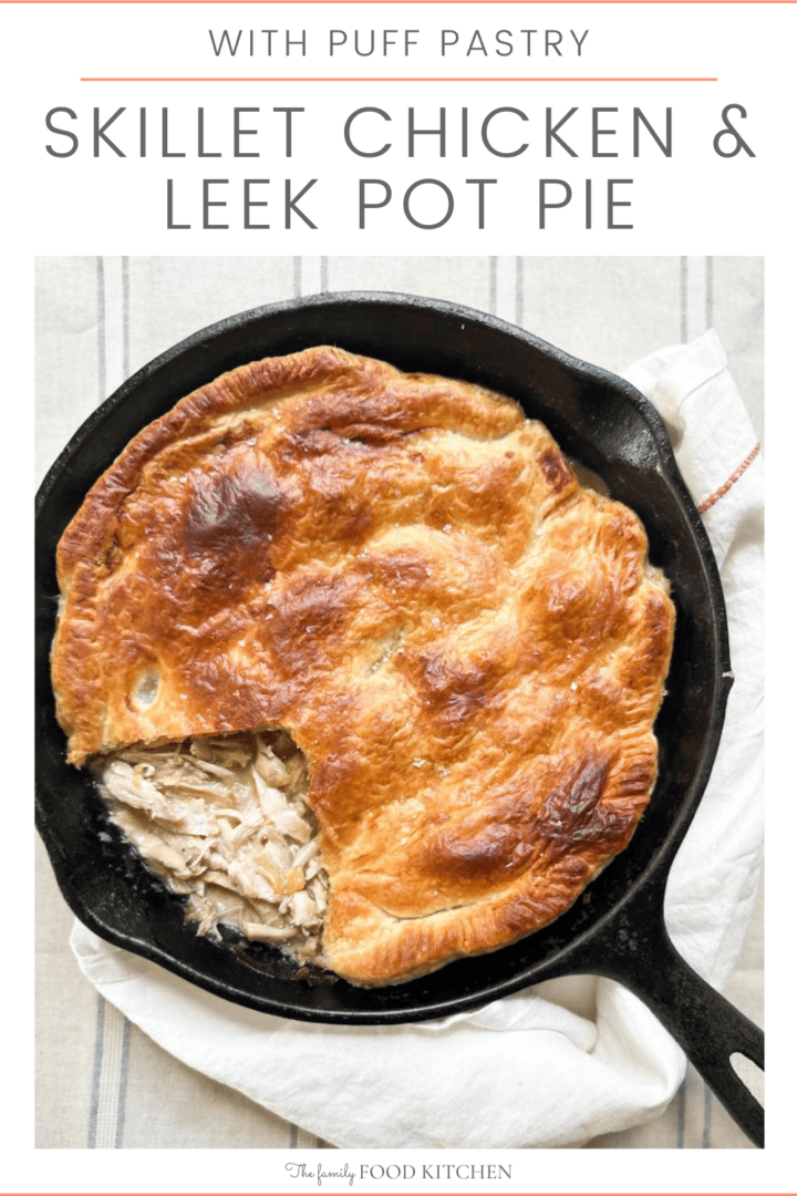 Pinnable image with recipe title and a skillet filled with cooked chicken and leek pot pie.