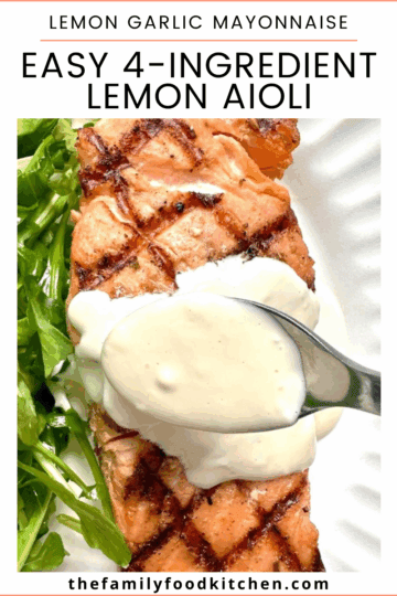 Pinnable image with recipe title and a plate of grilled salmon fillet served with arugula and a slice of fresh lemon with lemon aioli being spooned over.