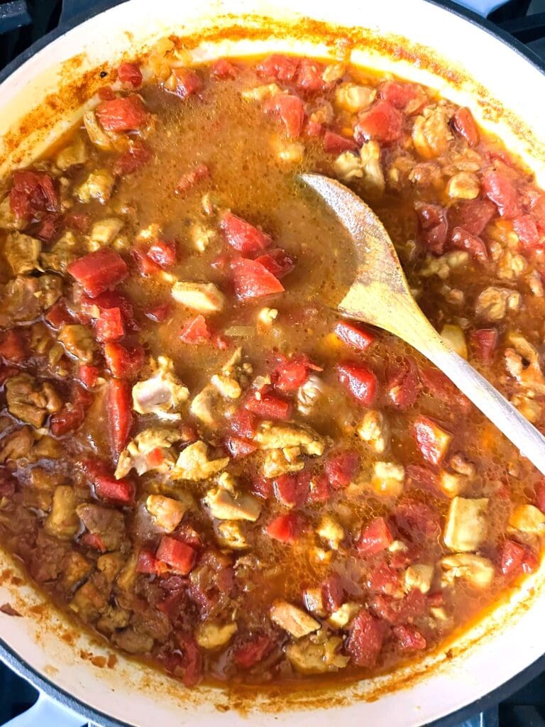 A Dutch oven of chicken tikka masala soup.