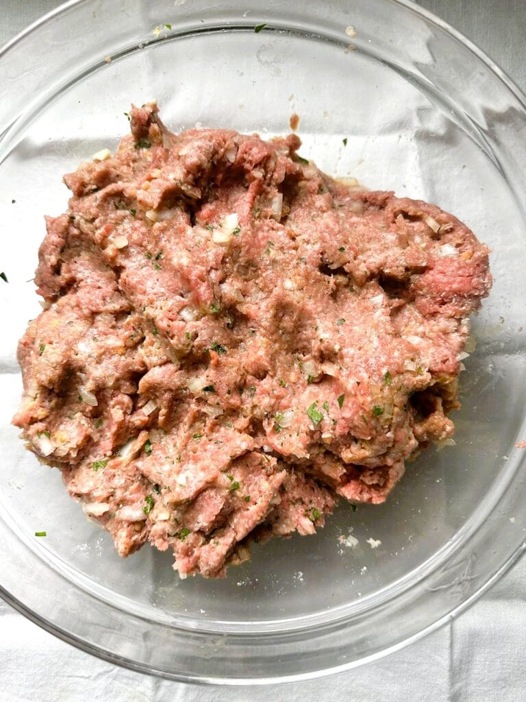 A large bowl of gluten-free meatball mixture.